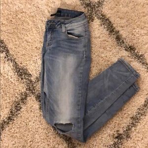 Jeans with holes on the knees